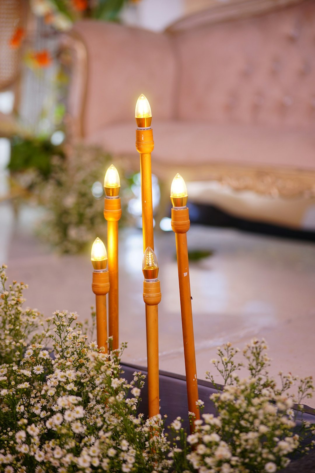 A bunch of candles that are on a table
