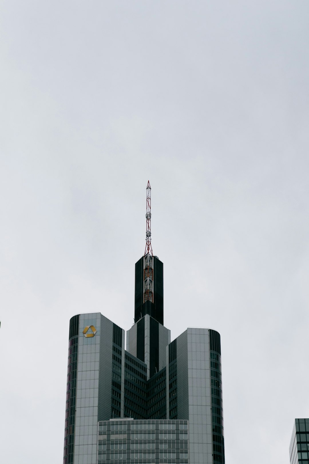 Modern skyscraper against an overcast sky