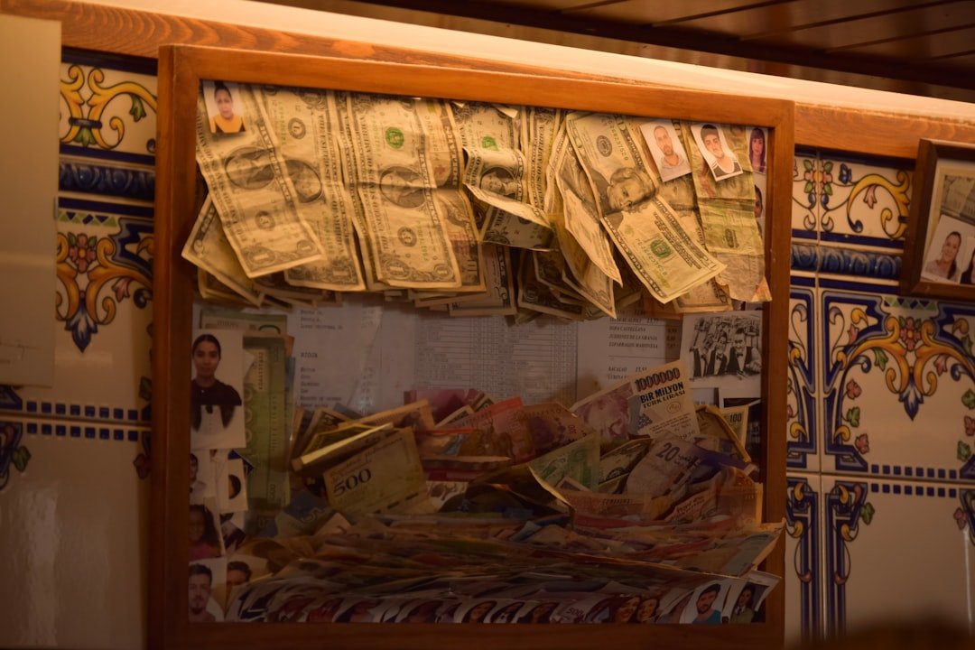 Framed display of various currencies and banknotes
