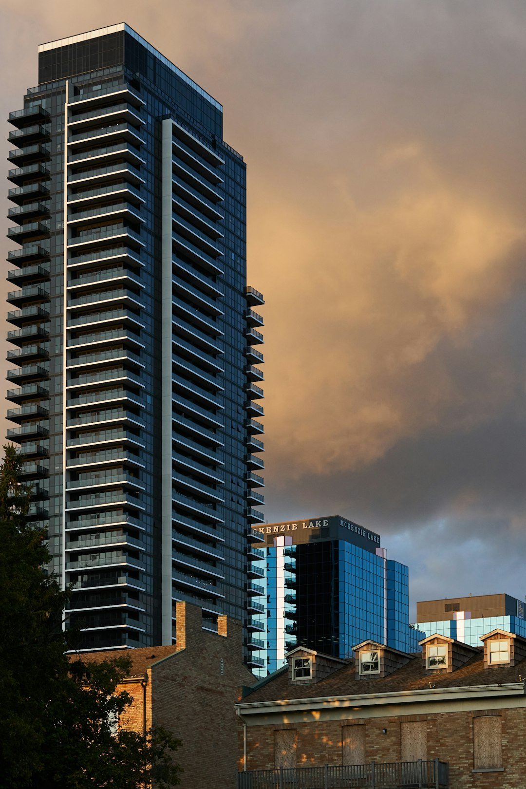 Modern high-rise buildings against a cloudy sky