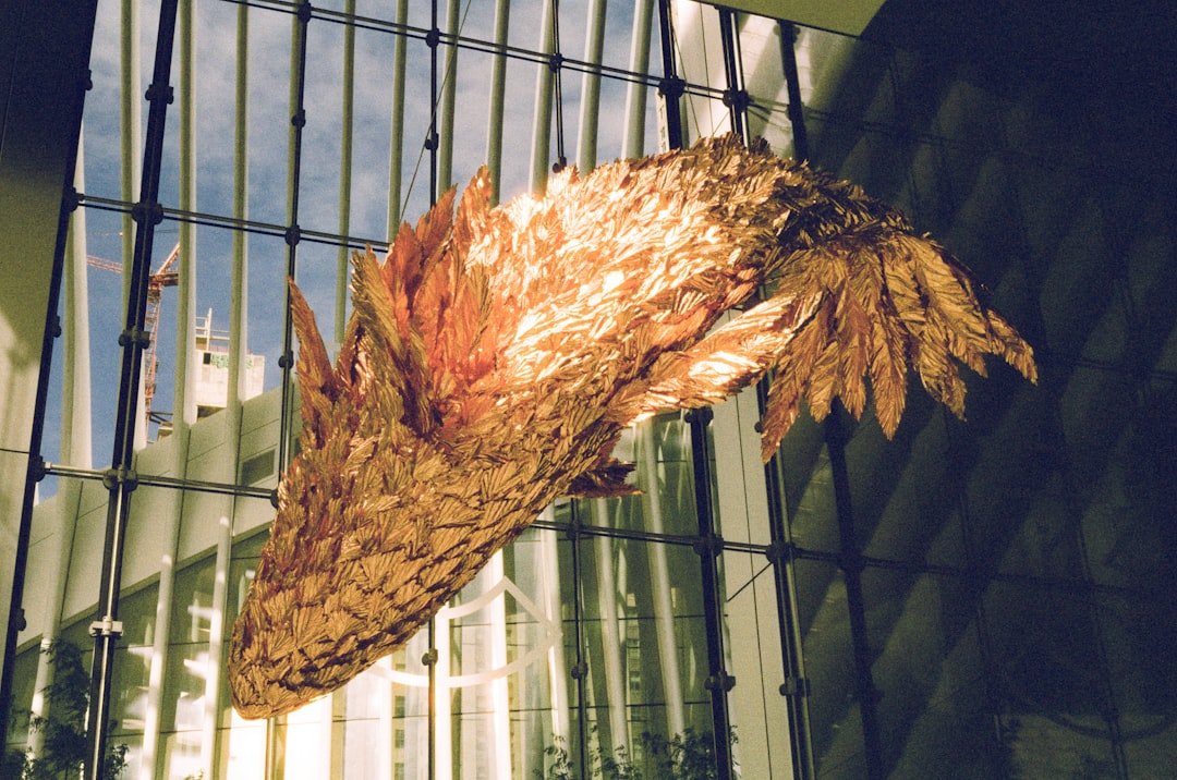 Golden dragon head sculpture hanging indoors
